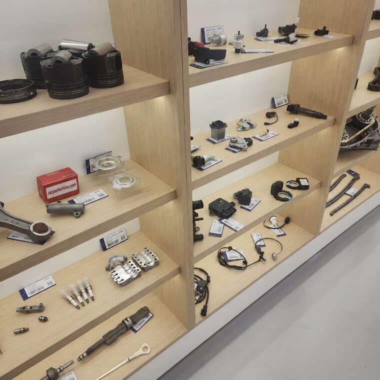 CarPartsChina showroom in Guangzhou with engine, brake, suspension and electrical parts on display